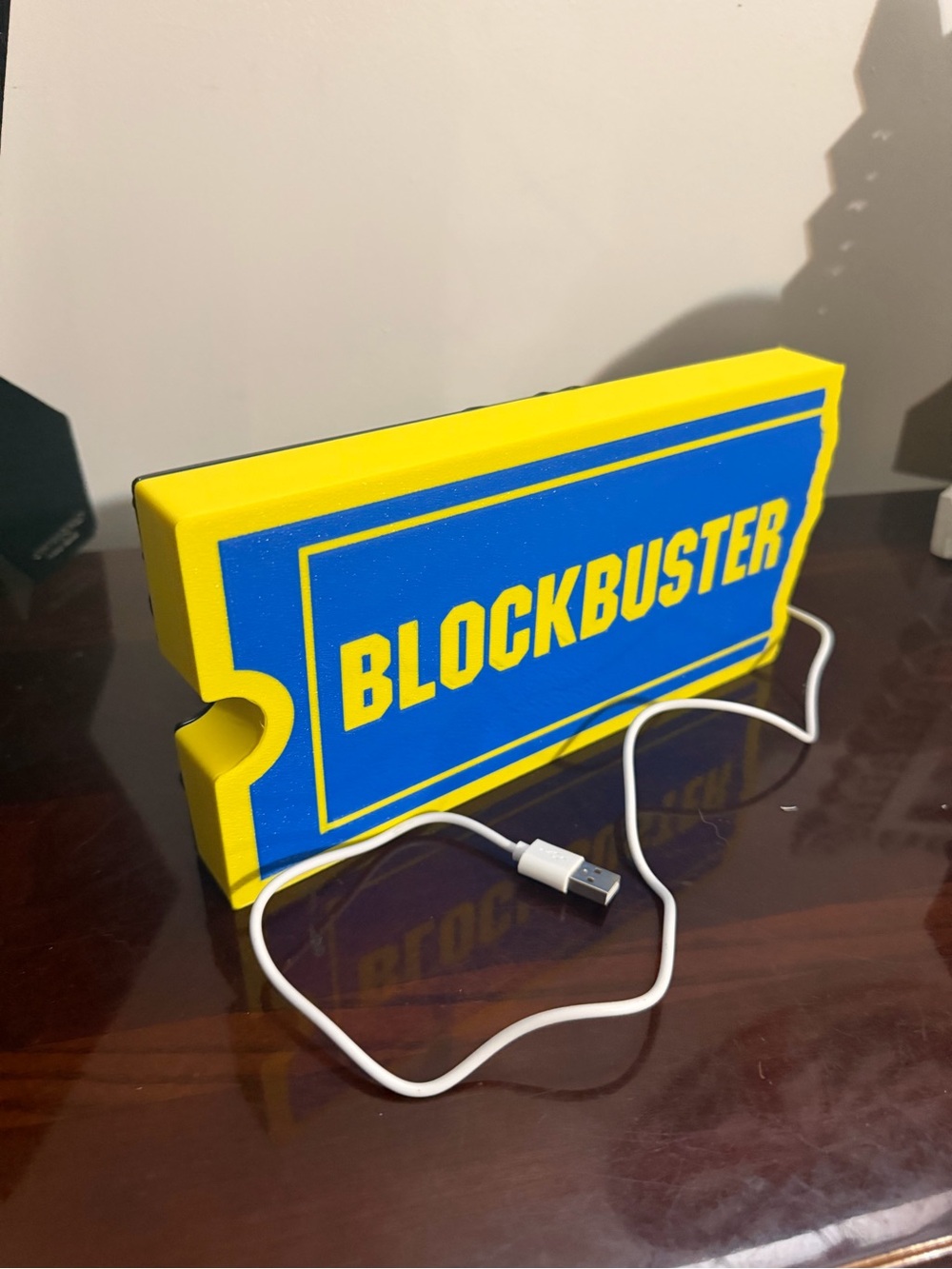 Blockbuster Logo Light — Blue and Yellow Retro Sign